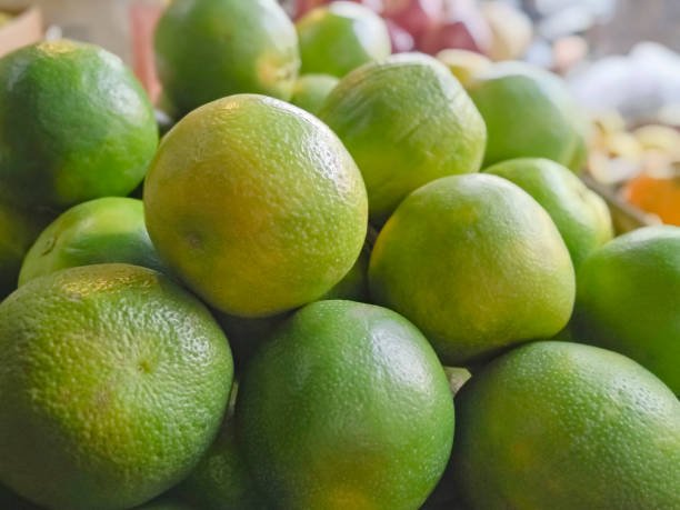 Full frame shot of large group of sweet lime or Mosamb at fruit stall.